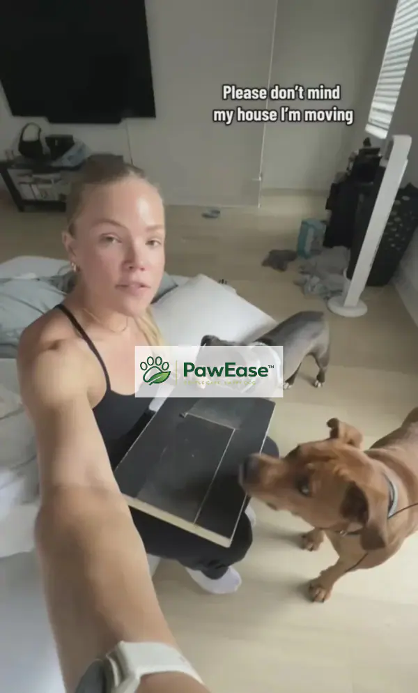 Customer holding NailEase board with dogs